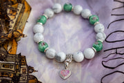 cremation bracelet howlite green flower beads with opal heart pendant with cremation ash, on silk